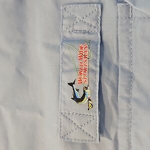 NWT- World Wide Sportsman Men's XL Long-Sleeved Blue Button Down Shirt.